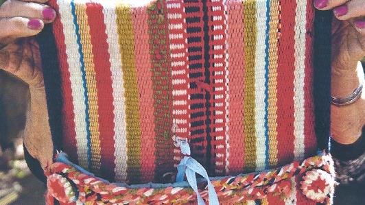 Tejedora de Comunidad Indígena "Yastay" de Juntas de Valeriano Inauguración de la exposición textil "Urdiendo la Historia" en el Museo Histórico Gabriel González Videla de La Serena, diciembre 2019.